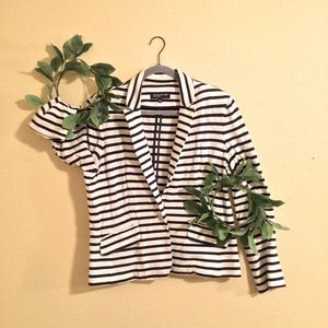 Blazer to dress up or down. False pockets. Rarely worn. Navy blue and white.